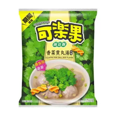 Cilantro and pork ball soup flavored Pea Crackers, sold in Taiwan. The packaging has an overflowing image of bright green cilantro leaves as background. In the foreground is a bowl of clear pork broth, with several Taiwanese meat balls and bits of chives, topped up a generous pinch of cilantro leaves. The pea crackers are not colored any differently than regular pea crackers.