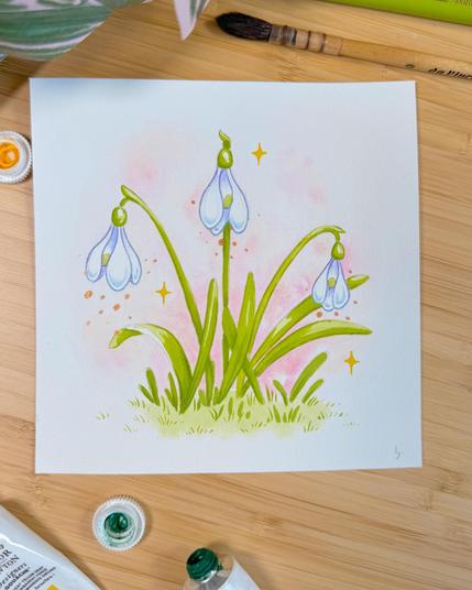 A photo of a gouache painting of a cluster of snowdrops with a soft pink background with stars surrounding it and bronze metallic details added.