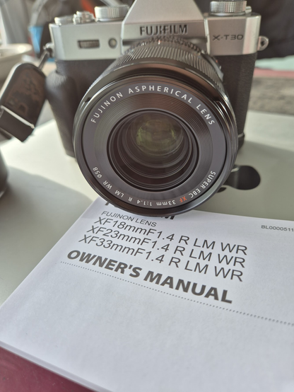 Fuji Film X-T30 with XF 33mm lens mounted. Bring on those low light settings!