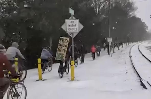 Clip from Tim's video where he shows clips from all of the rides supporting Minnesota/Alex Pretti. This one is people riding in the snow alongside railroad track