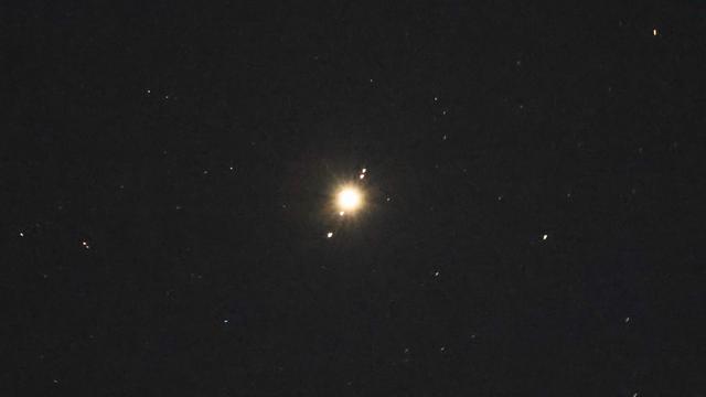 Jupiter and his moons in alignment in the night sky over Trumbull, CT