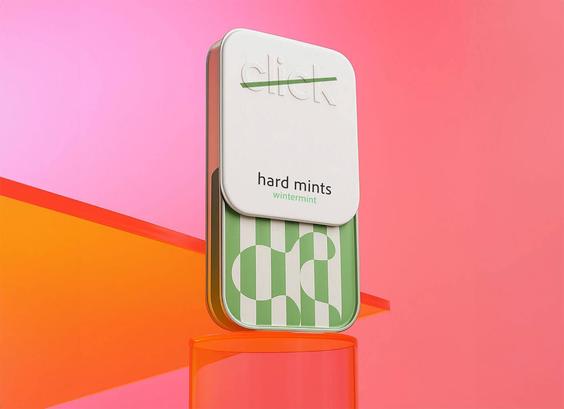 A mint tin labeled "click hard mints, wintermint," displayed against a vibrant pink and orange background, emphasizing its modern design.
