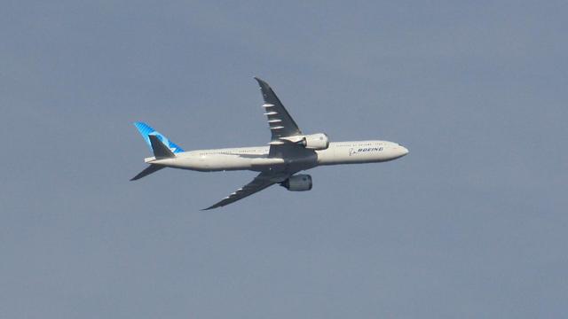Boeing 777-9 prototype #3 N779XY on climbout from Portland International Airport PDX after a touch & go on Runway 10L. Beginning its left turn back toward Seattle, sunlight enhanced features on the bottom of the wings including the boundary of the fold-up wingtips which make the plane wider than a 747-8 in flight but narrowed to the span of a 777-200LR/777-300ER when taxiing at airports to fit at the same gates.
photo by Ian Kluft
February 3, 2026
Portland, Oregon, USA