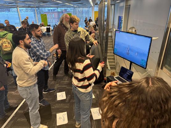 Four people playing a game