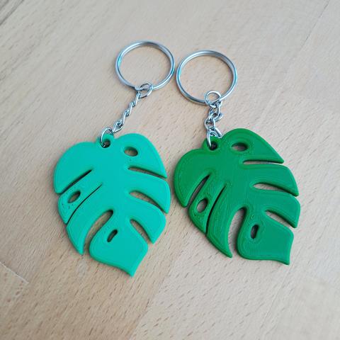 2 porte-clés représentant des feuilles de Monstera avec 2 verts différents