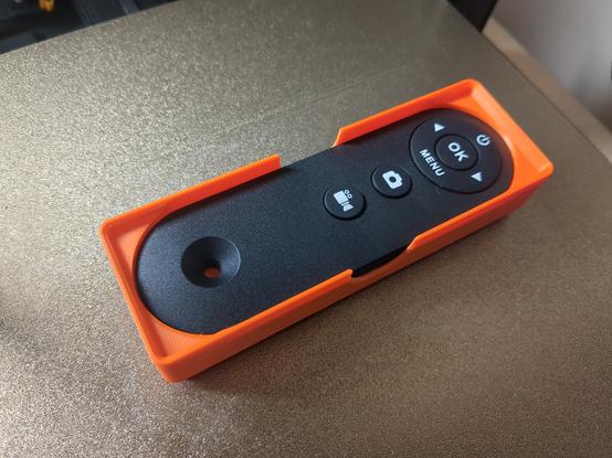 Photograph of the Gridfinity holder with the remote inside.