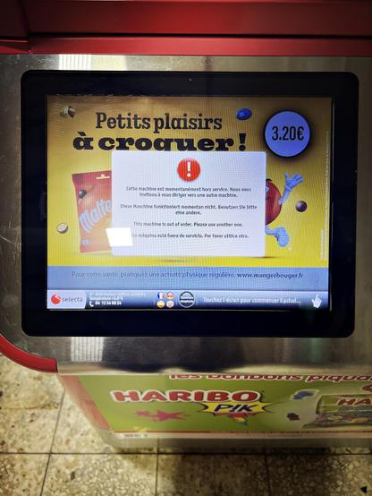 Écran annonçant la panne de la machine à distribuer de la mal bouffe