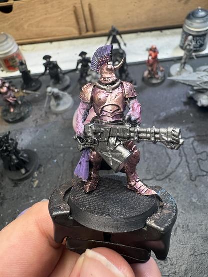 Anointed Heavy Infantry in bronze armor, purple crest and a heavy flamethrower