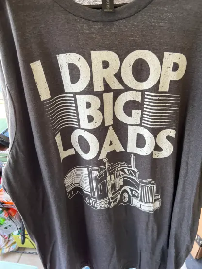 tshirt with a semi truck on it and the text "I DROP BIG LOADS"