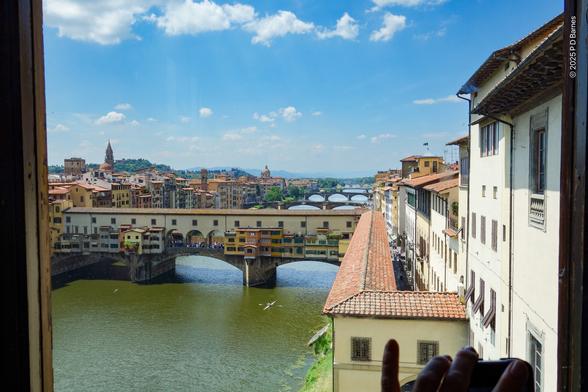 View of several of the bridges over the Arno in Florence, seen through a window of a shop on the Ponte Vecchio