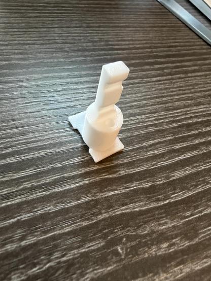 The 3D printed signal mount sitting on my desk