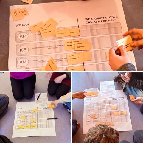 Pictures showing game in play on floor during community group meeting yesterday.