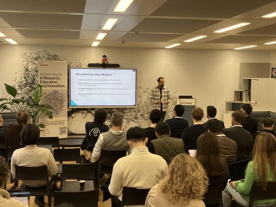 A data scientist addressing an audience of peers