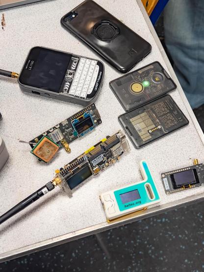 Various LoRa trackers on a table.