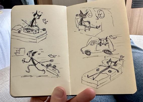 An open sketchbook showing a sequence of five drawings. 

1- A little gremlin is struggling to close an overflowing suitcase.

2- The same little gremlin running across an airport aisle pulling the suitcase.

3- The little gremlin sitting in an airplane and looking out the window,

4- The little gremlin riding a hotel shuttle.

5- The little gremlin exhausted and finally resting at a hotel bed.