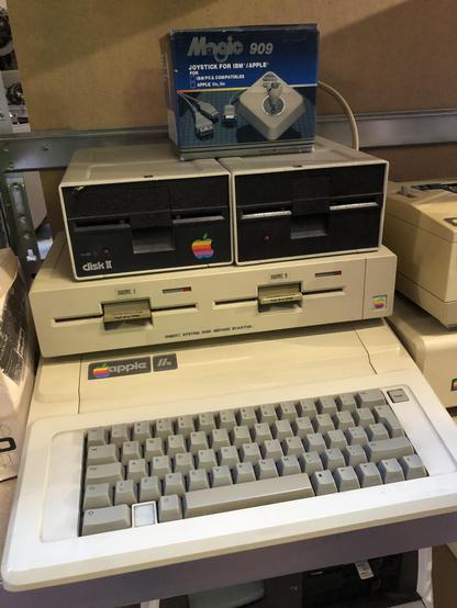 Apple IIe with floppy drives and a Magic 909 joystick