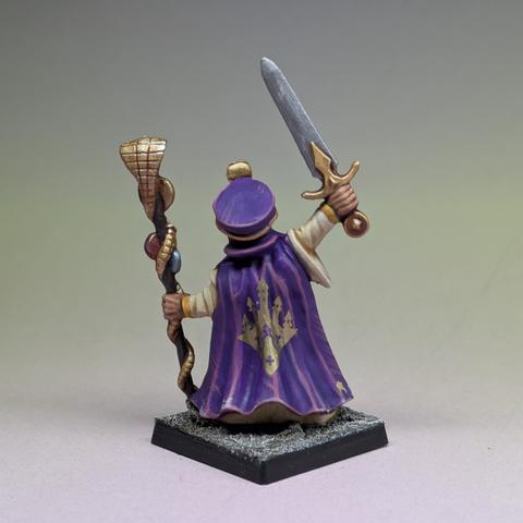 Rear of model showing the long purple cape. It has a golden city design on the back.
