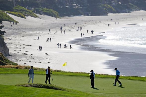 Pebble Beach features wild weather and strongest field this year