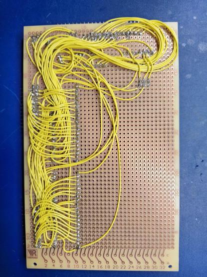 The back of the protoboard, showing a huge jumble of wires.