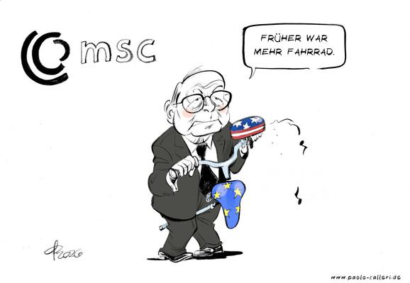 Karikatur "Sicherheitskonferenz" aus dem Jahr 2026. Wolfgang Ischinger steht vor dem Logo der Sicherheitskonferenz. In seinen Händen hält er einen Fahrradlenker mit einer Klingel, die in den Farben der U S Flagge gestaltet ist. Zwischen seinen Beinen hat er einen blauen Fahrradsattel mit gelben Sternen geklemmt. Ischinger spricht: Früher war mehr Fahrrad.