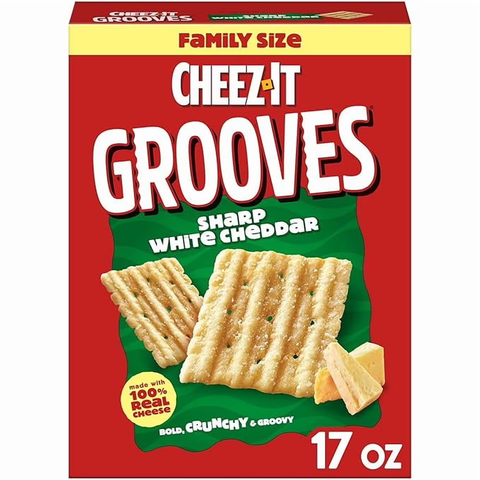A promotional photo of a 17oz 'Family Size' box of Cheez-It Grooves Sharp White Cheddar crackers. Cheez-It is a brand of cheese crackers manufactured by Kellanova through its Sunshine Biscuits division. Approximately 26 by 24 mm (1.0 by 0.94 in), the square crackers are made with wheat flour, vegetable oil, cheese, skim milk, salt, and spices.