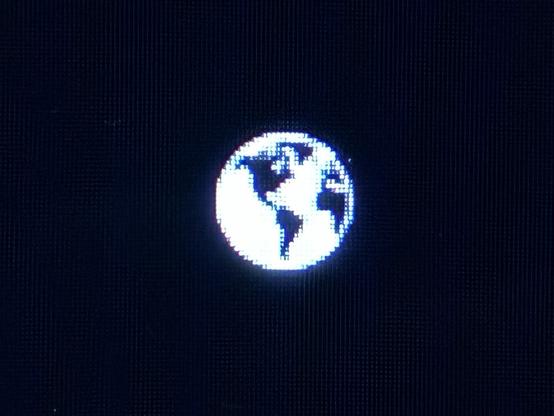 Pixelized black and white earth globe.