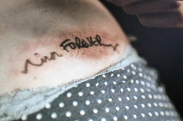 A tattoo saying "Nina Forever" from the 2016 film