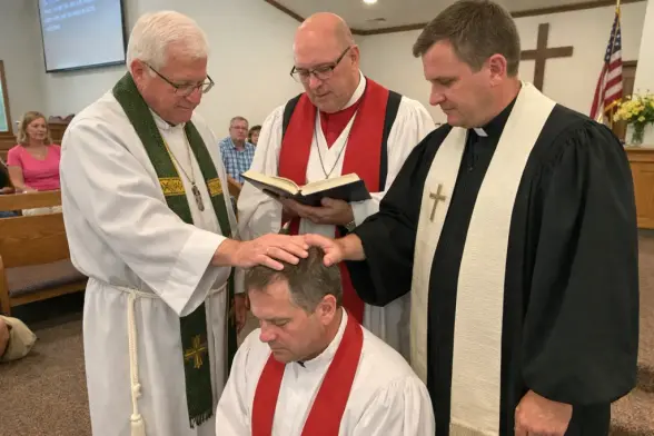 Pastor teaching in a church setting representing the question is ordination required for Christian ministry.