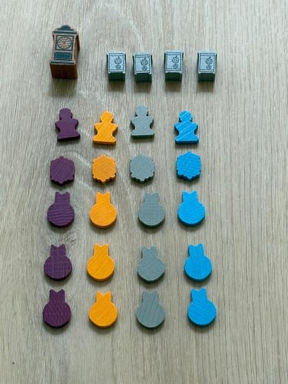 Board games tokens neatly arranged in a grid