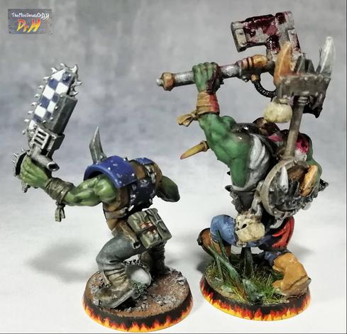 Ork Boy miniature (left), and the modified Ork Nob miniature (right). Rear view.