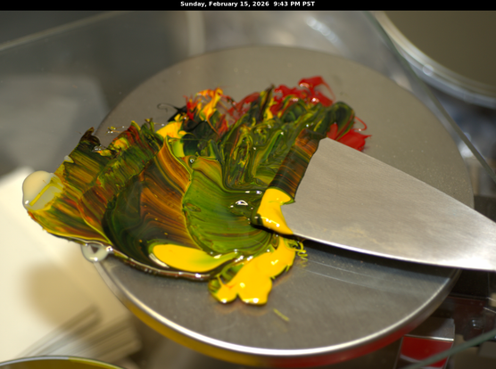 Mixing of letterpress inks on a sheet of glass.