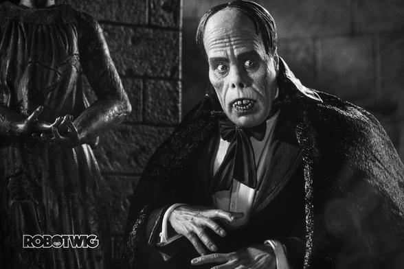 The Phantom walks the corridors of the opera house at night.