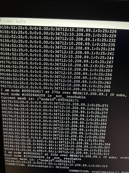 Not very useful photo of my laptop screen showing the serial console with sensor readings and warnings about the mesh