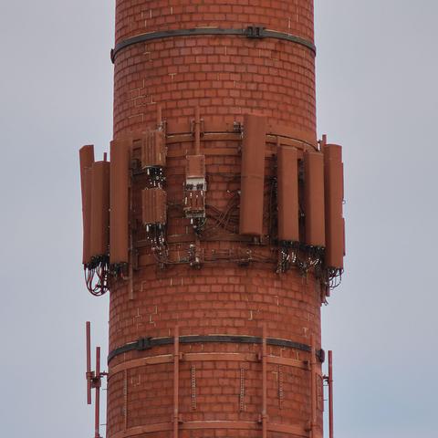 This smokestack used to serve for the Alcoa factory in an industrial area of town; now it serves as a cell tower, and a logo for Pivotal Brewing Company.
