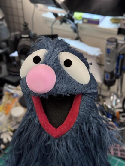 A Grover like monster puppet, close up view