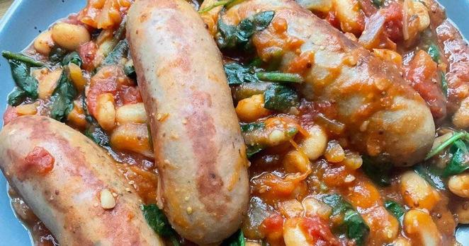 Home cooked sausages with beans and sausages.