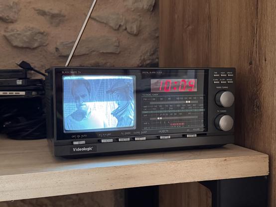 TV alarm clock displaying a TV channel