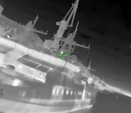 A screenshot from a video released by Ukraine's General Staff on Feb. 21, 2026, showing a strike on a Russian Coast Guard vessel. (General Staff)