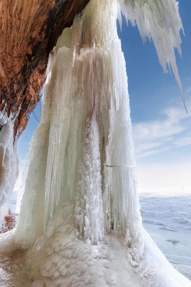 A photo showing a icefall, or frozen waterfall, at the Apostle Islands outside the ice caves.