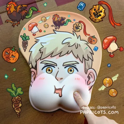 a mousepad of Laios from Delicious in Dungeon. His cheeks are stuffed with food (and memory foam)