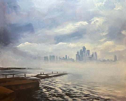 A 20-by-16-inch acrylic painting on canvas depicting Hudson Yards as seen from Hoboken across the Hudson River. In the foreground, dark brown piers and dock posts extend diagonally into rippling water, their edges catching soft light. The river surface reflects muted grays and silvers under a hazy sky. In the distance, the Hudson Yards skyline rises through mist, with clustered glass towers partially veiled by atmospheric haze. The sky is expansive, filled with layered clouds in pale blues, grays, and warm creams, suggesting early morning or late afternoon light. The overall mood is quiet and atmospheric, with softened edges and diffused light.