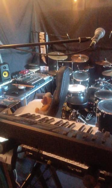 The micro blackbox theatre and studio under house lights. BEHIND THE MUSIC.