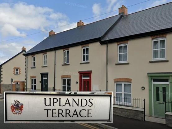 The new Uplands Terrace street nameplate in Morriston, featuring Swansea's coat of arms — the first of a new generation of signs being rolled out across the city. Image: Swansea Council/Google Maps