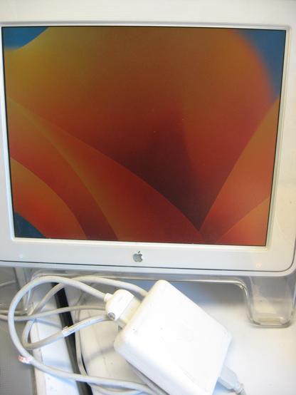 An Apple DVI to ADC adapter with a retro Apple cinema display, working as intended