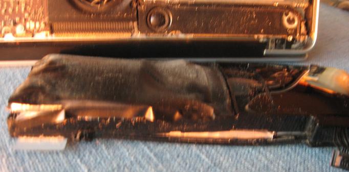 The battery from a 2012 Mac pro, deformed from expanding into the "spicy pillow"