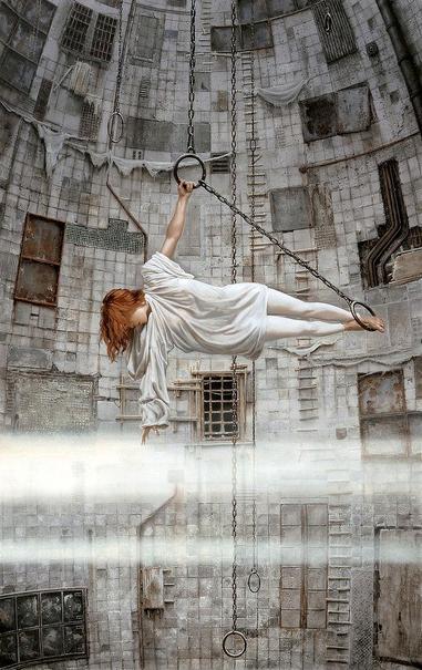 In a vast chamber lined with square concrete panels, a woman grips an iron ring to hang suspended in a sideways T. A taut chain extends from the ring on a diagonal down to another metal loop where she anchors her bare feet. Gravity tugs on her fiery orange hair as she reaches down to touch a broad band of mist. The hood of her loose white top spills down as do both sleeves, one bunching at the shoulder to expose her arm—her torso prevents it from falling farther—while unobstructed the other sleeve billows loosely. There is some curvature to the wall behind her, which tapers inward at the top. Boards are tacked in staggered lines extending ladder-like up the wall. A grungy tactile delight, the place looks weathered with tattered cloth draping the concrete in places. A variety of openings are covered by rusty grates or metal plates.