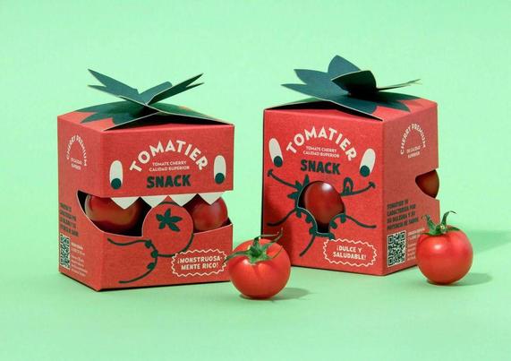 Bright red tomato snack boxes with playful designs, featuring cherry tomatoes and green accents, against a mint background.