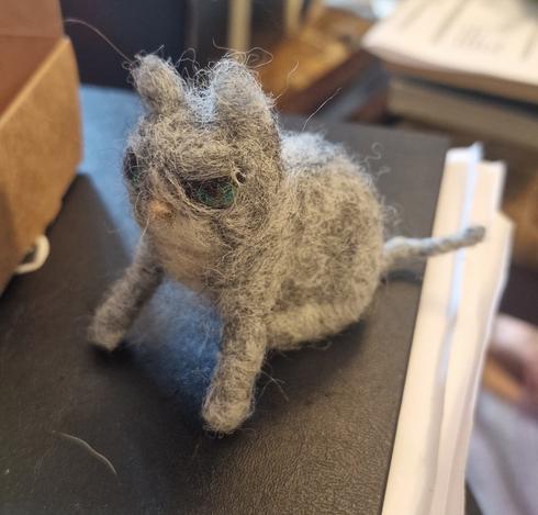 The same grumpy grey felt cat