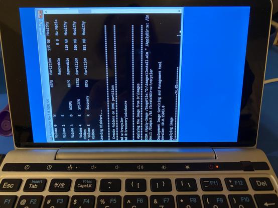 GPD Pocket 2 micro-laptop installing the factory version of Windows 10 with the display rotated 90 degrees because that's how it rolls during setup
(it'll fix itself later)