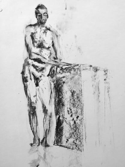 Drawing portrait of a naked male art model